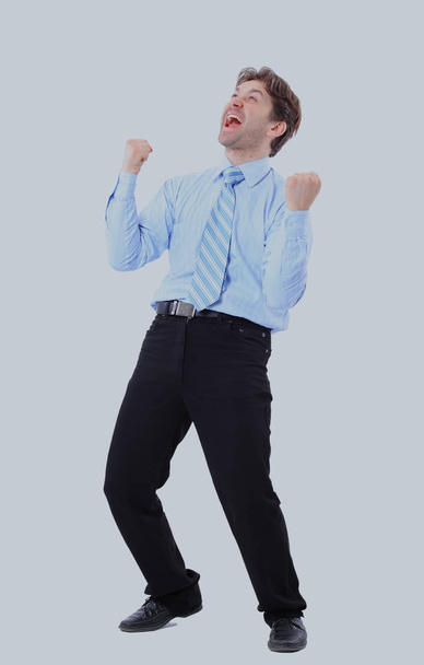 One very happy energetic businessman with his arms raised. - Фото, зображення