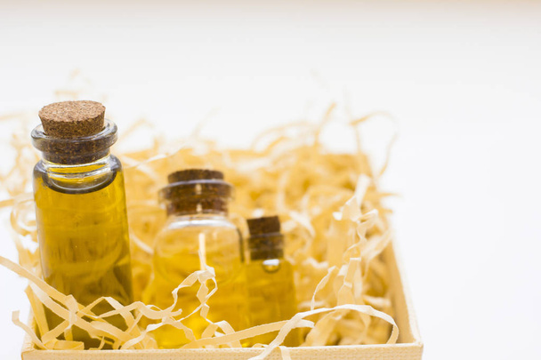 Essential oil in bottles and vitamins - Valokuva, kuva