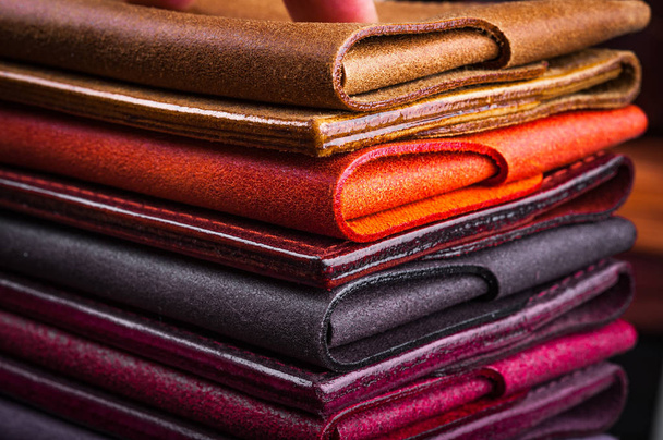 close up shot of colorful pile with leather wallets - Fotó, kép