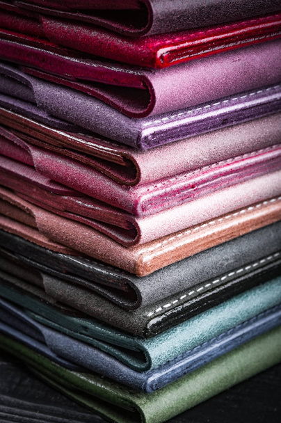 close up shot of colorful and fashionable leather wallets - Fotó, kép