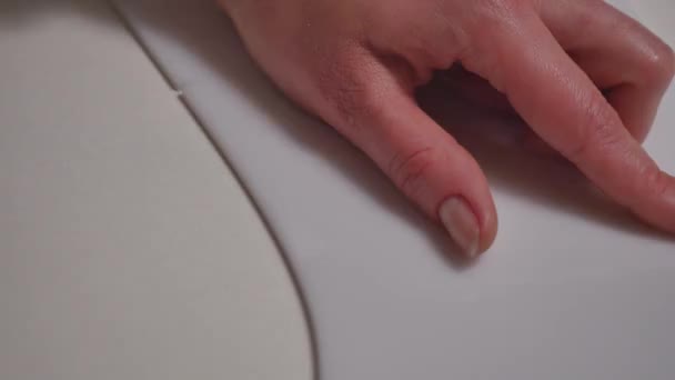 seamstress prepares materials for cutting - 映像、動画