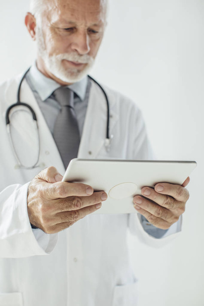 Doctor Holding Tablet - Фото, изображение