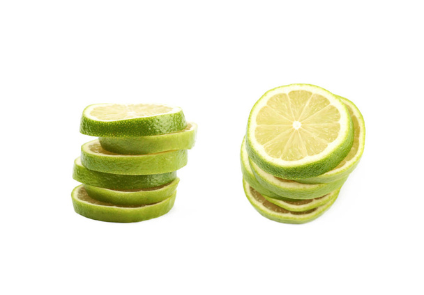 Pile of multiple lime slices isolated - Фото, зображення