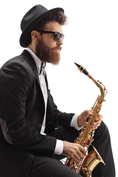 Jazz musician with a saxophone - Фото, зображення