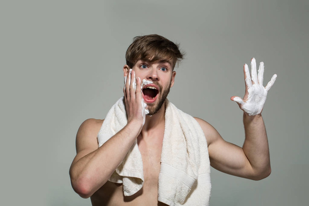 Man apply shaving cream or foam on bearded skin - Foto, Imagen