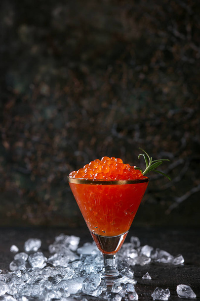 Glass of red caviar - Фото, изображение