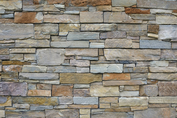 Moderní kamenná cihlová zeď pozadí. Kamenná textura. - Fotografie, Obrázek