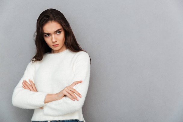 Close-up photo of upset brunette girl in soft sweater standing w - Photo, Image