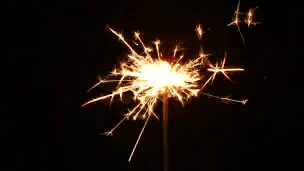 4k.Male hand lights fireworks . Dark background - Footage, Video