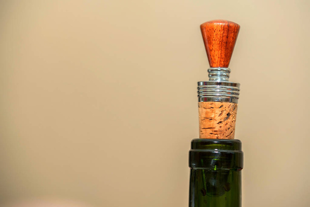 Wine stopper on wooden background close - Fotó, kép