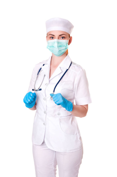Doctora en respirador sosteniendo fonendoscopio, aislada en blanco
 - Foto, Imagen