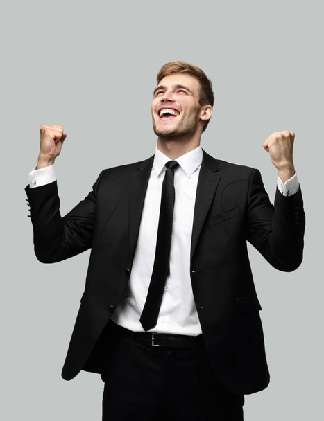 portrait of enthusiastic businessman isolated on a light background. - Foto, immagini