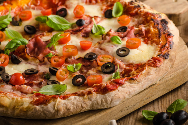 Rustic pizza with tomato, cheese, salami - Foto, Imagen
