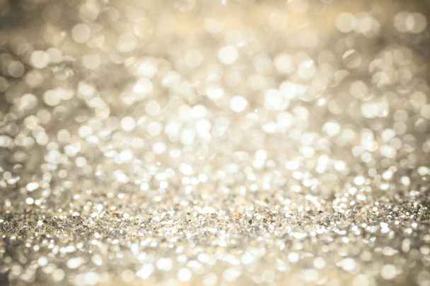 defocus of glitter vintage lights background. gold, silver and black for Christmas and new year background. - Foto, imagen