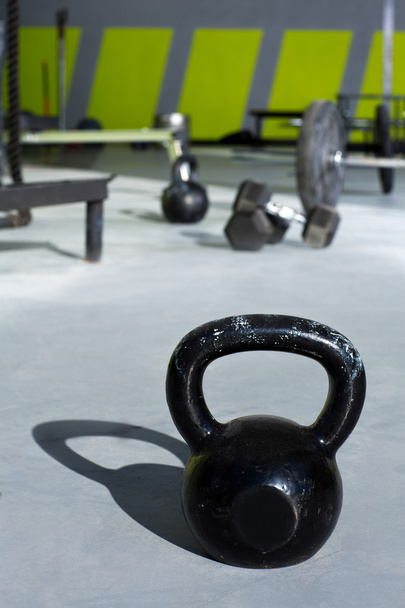 Kettlebell at crossfit gym with lifting bars - Fotoğraf, Görsel