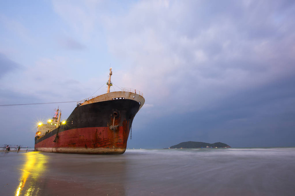 Cargo ship got stuck on the beach, Ship accidents happen often when the weather is stormy. - Photo, Image