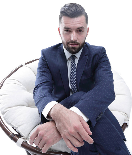 successful businessman sitting in a chair. - Fotó, kép