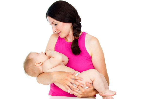 mother holding a baby - Fotó, kép