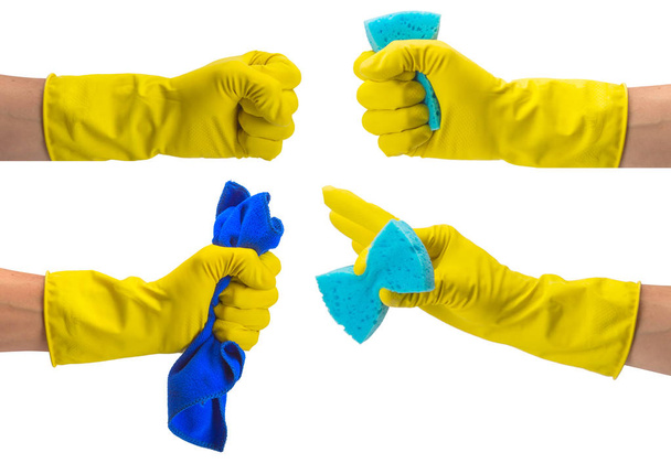 Χέρι σε κίτρινο γάντι καθαρισμού. Κρατήστε ένα σύνολο χειρονομιών - Φωτογραφία, εικόνα