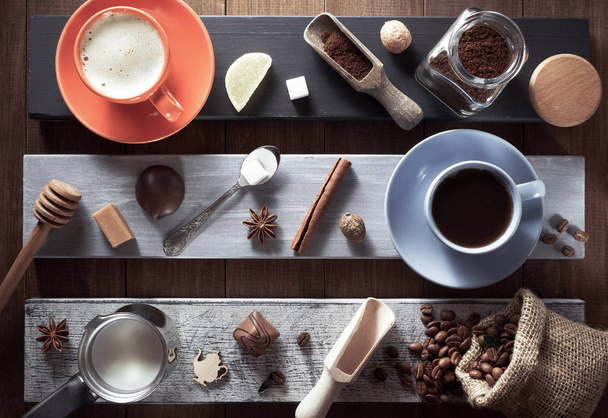 cup of coffee and ingredients on wood - Foto, Imagen