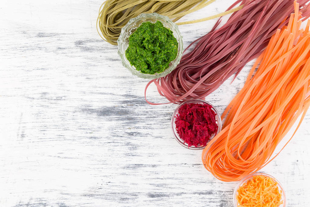 Colored Raw Vegetable Vegetarian Pasta. - Фото, изображение