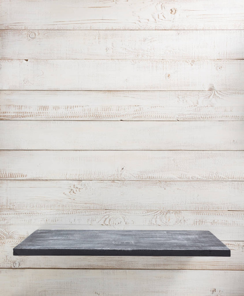 white shelf on wooden wall  - Foto, Bild