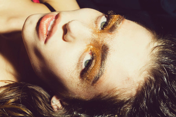 Pretty fashion girl with holiday glitter makeup - Фото, зображення