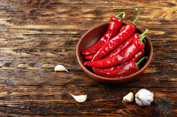 chili pepper in a plate - Фото, зображення