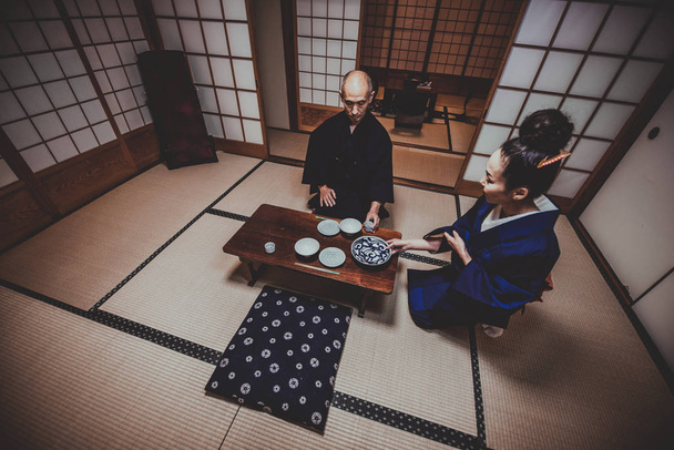 Senior japanese couple moments in a traditional house - Fotó, kép
