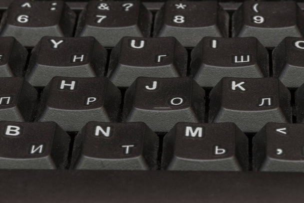 Black keyboard closeup. Keyboard pattern. Horizontal pattern. Vertical pattern. - Photo, Image