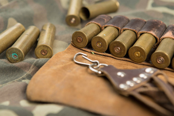 cartuchos de caza, munición de caza, bandolier
 - Foto, imagen