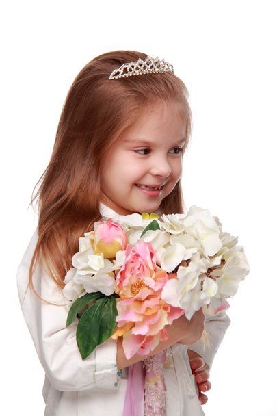 Little girl with a bouquet - Valokuva, kuva