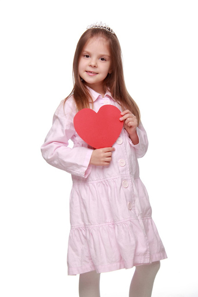 Little girl with a heart - Fotoğraf, Görsel