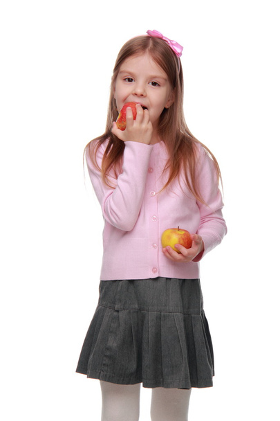 Little girl holding two apples - Φωτογραφία, εικόνα