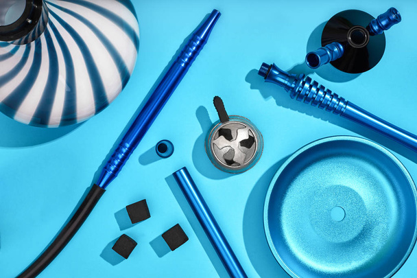 Top view of Hookah parts on light blue background - Photo, Image