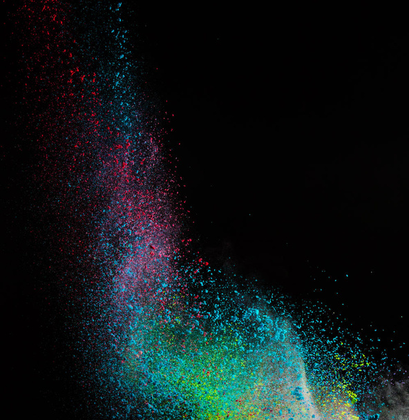Launched colorful powder, isolated on black background - Valokuva, kuva