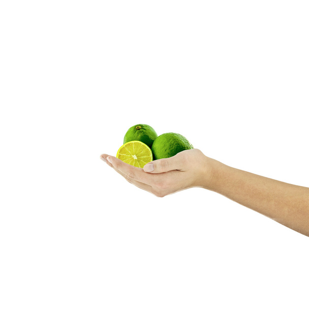 ασβέστη κοκτέιλ βιολογικά φρούτα χέρι λαβή δάχτυλο διατροφή συνταγές Υγιείς σαλάτα απομονωμένες χορτοφάγος βιβλίο μαγειρικής - Φωτογραφία, εικόνα