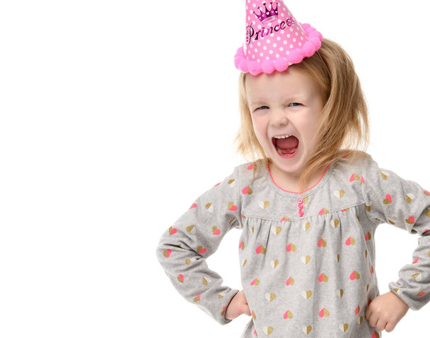 Young girl kid surprised shout in birthday party pink cap - Foto, Imagem