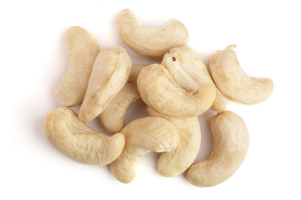 cashew pähkinät eristetty valkoisella pohjalla. ylhäältä. Litteä
 - Valokuva, kuva