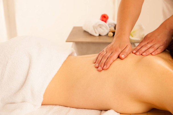 Body care. Spa body massage treatment. Woman having massage in t - Фото, изображение
