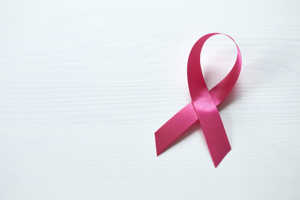 Ribbon for breast cancer awareness white wooden - Fotoğraf, Görsel
