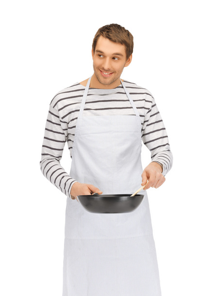 Handsome man with pan and spoon - Photo, image