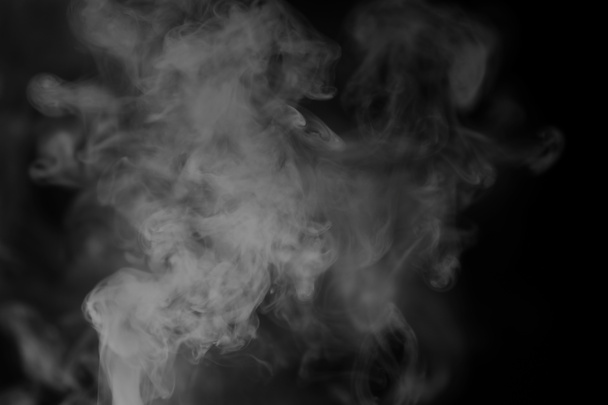 White smoke on a black background. Texture of smoke. Clubs of wh - Photo, Image