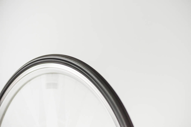 bicycle wheel in motion isolated on white - Valokuva, kuva