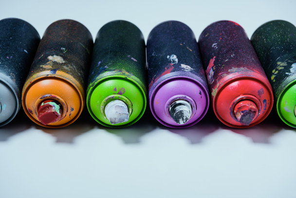 close up view of arranged colorful spray paint in cans - Photo, Image