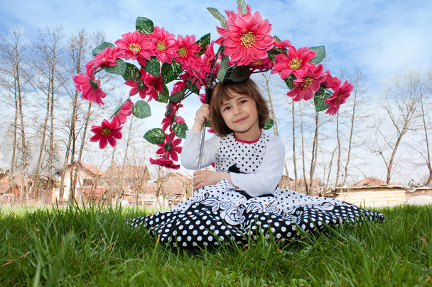 Little girl with a flower umbrella - Photo, image