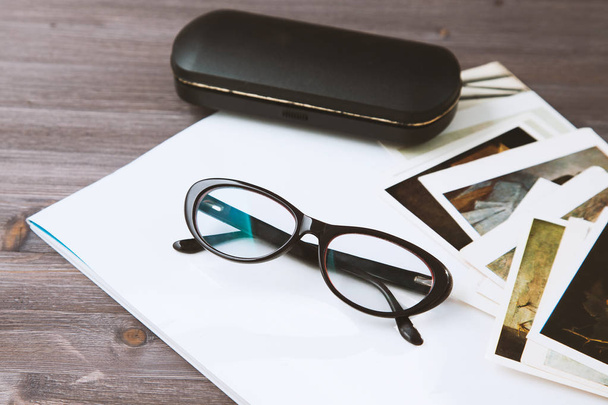 Top view of notebook,glasses on wooden,this image for business cincept. - Valokuva, kuva