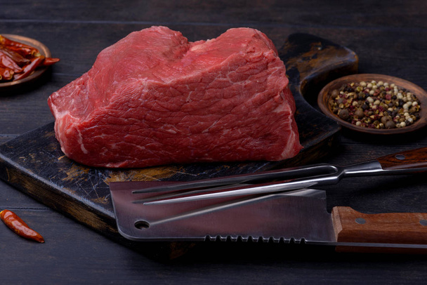 Big piece of beef meat for steak with knife and fork - Photo, Image