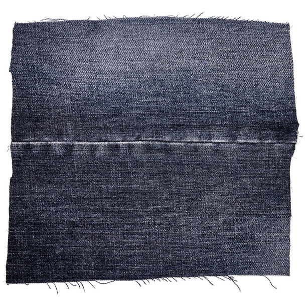 Piece of dark jeans fabric - 写真・画像