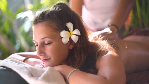 Caucasian woman having outdoor spa massage - Footage, Video
